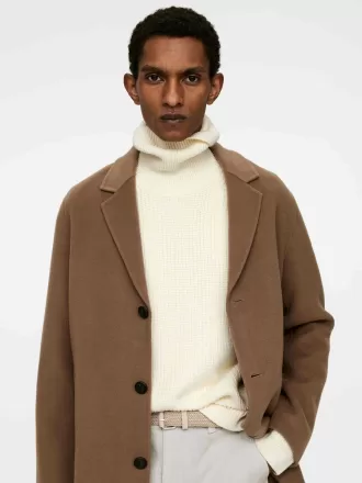 Geflochtener Gürtel mit Lederbesatz