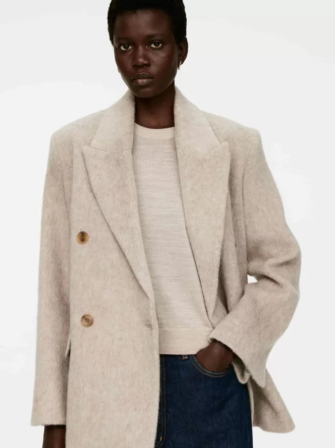 Gestricktes T-Shirt aus Merinowolle Gestricktes T-Shirt aus Merinowolle