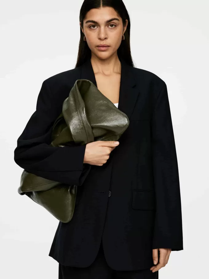 Glänzende Ledertasche Glänzende Ledertasche