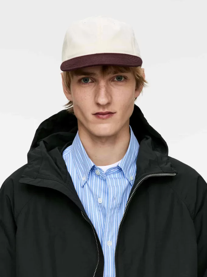 Kappe in Kontrastfarbe Kappe in Kontrastfarbe