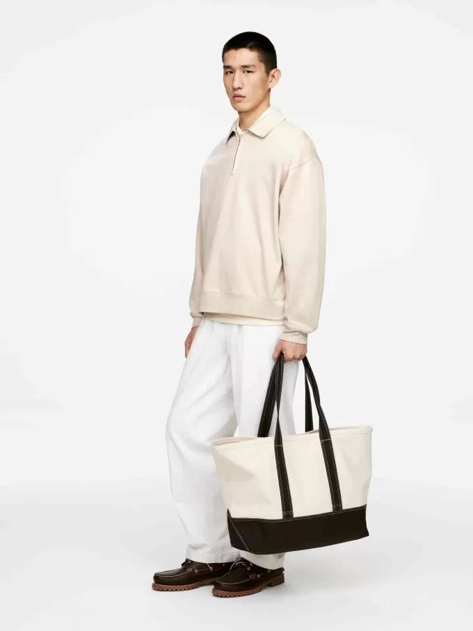 Poloshirt mit halbem Reißverschluss Poloshirt mit halbem Reißverschluss