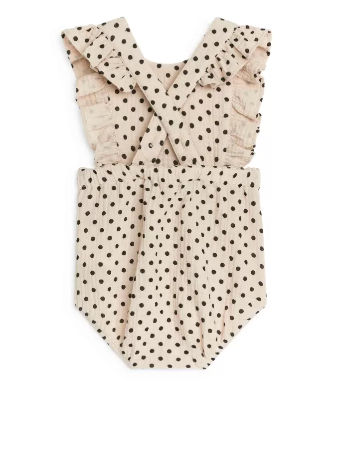 Strampler aus Musselin mit Rüschen Strampler aus Musselin mit Rüschen